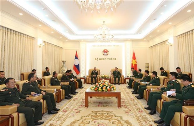 Vietnam y Laos continuan promoviendo cooperacion en defensa fronteriza hinh anh 1