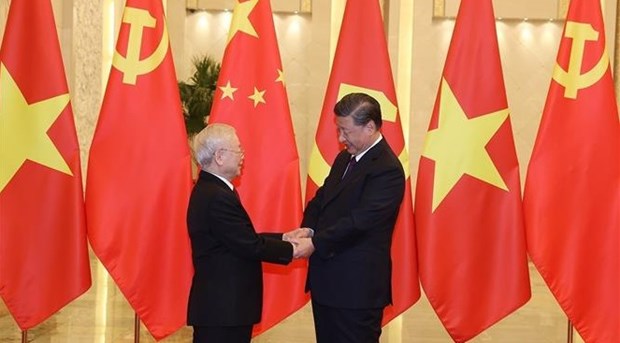 Efectuan en China acto de recibimiento al secretario general de PCV hinh anh 1