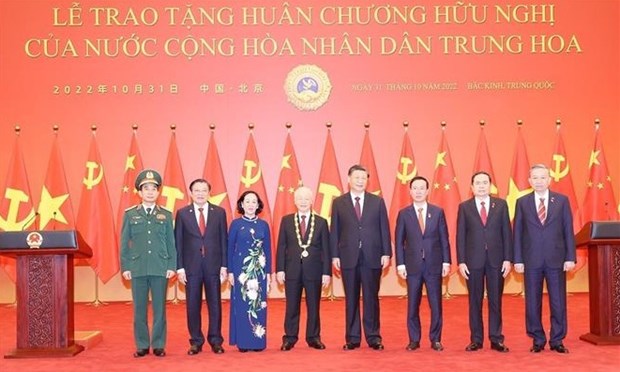 Visita del secretario general del PCV a China afianza nexos bilaterales hinh anh 2