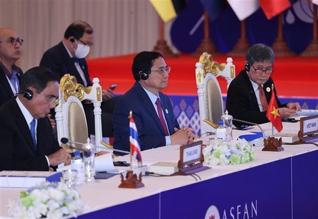 Premier vietnamita participa en las Cumbres de la ASEAN con Japon, EE. UU. y Canada hinh anh 3