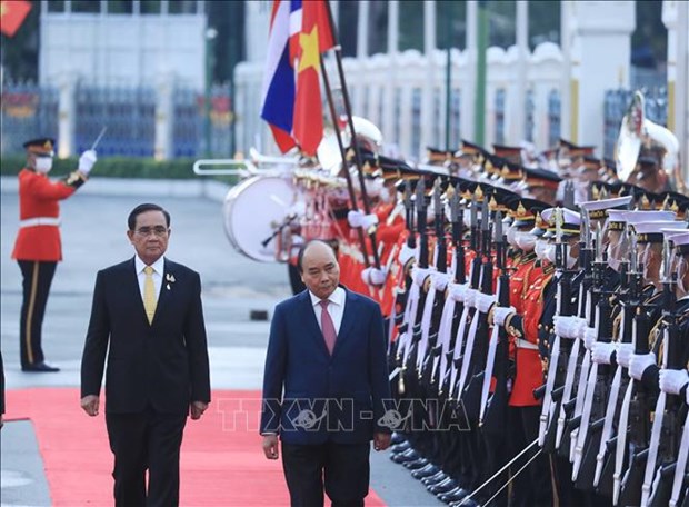 En Bangkok ceremonia oficial de bienvenida al presidente vietnamita hinh anh 1