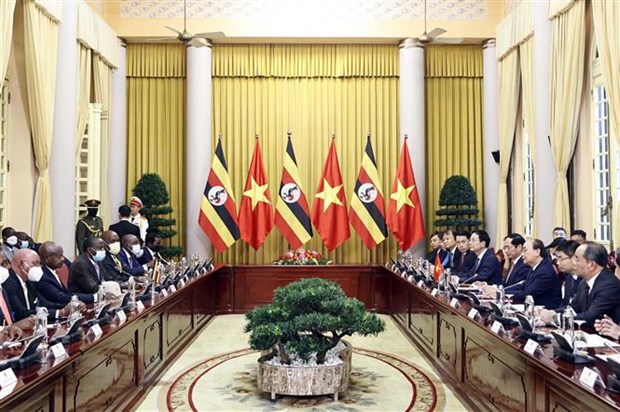 Presidente vietnamita preside ceremonia oficial de bienvenida a homologo ugandes hinh anh 2