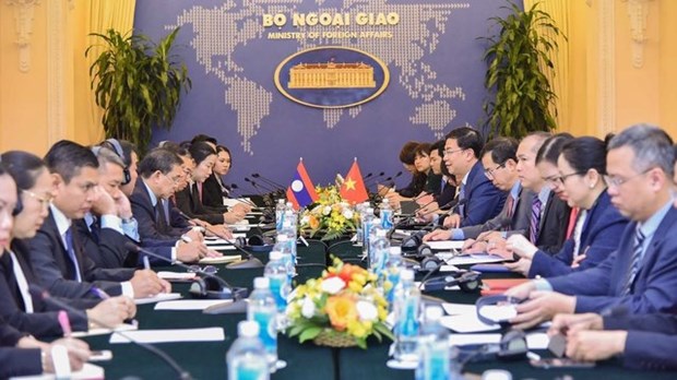 Efectuan septima consulta politica Vietnam-Laos hinh anh 2