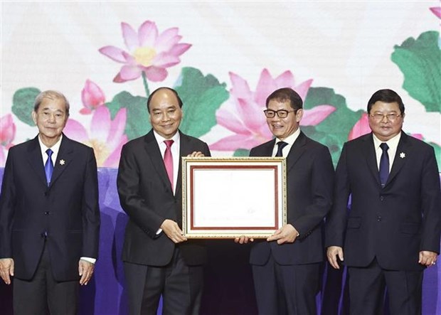 Presidente vietnamita exhorta a THACO a ser pionero de productos respetuosos con ambiente hinh anh 1