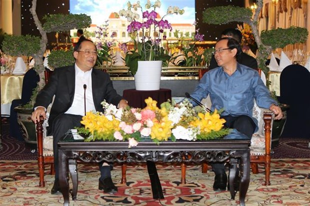 Ciudad Ho Chi Minh promete crear condiciones favorables para inversores laosianos hinh anh 1