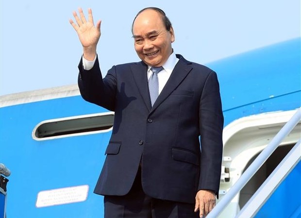 Presidente de Vietnam parte de Hanoi rumbo a Indonesia hinh anh 1