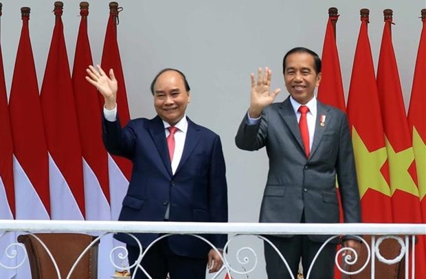 Ceremonia oficial de bienvenida al presidente vietnamita en Indonesia hinh anh 1