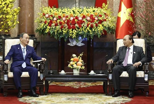 Presidente vietnamita aprecia aportes del expremier japones a nexos binacionales hinh anh 1