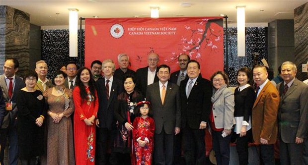 Vietnamitas residentes en Canada celebran el Tet (Ano Nuevo Lunar) 2023 hinh anh 1