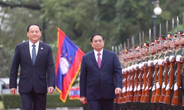 Premier vietnamita inicia visita oficial a Laos hinh anh 3