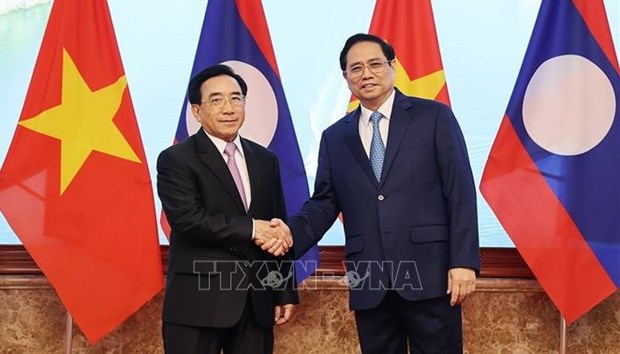 Visita del premier de Vietnam a Laos reafirma solidaridad invariable entre ambos paises hinh anh 1