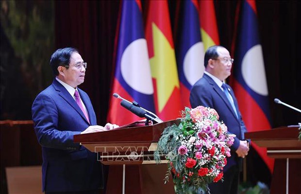 Enaltecen resultados de visita del premier vietnamita a Laos hinh anh 2