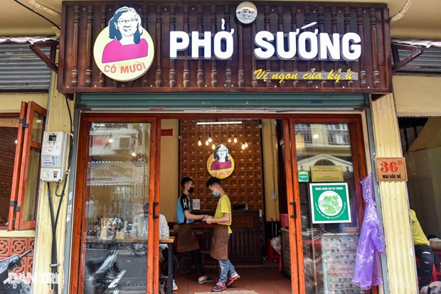 Nombres unicos distinguen a restaurantes de Pho en Hanoi hinh anh 1