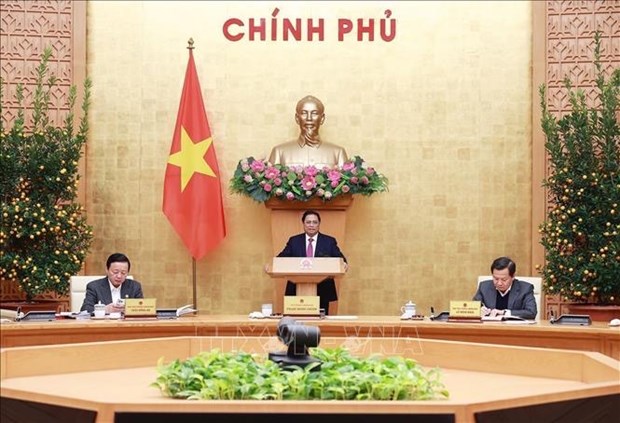 Premier vietnamita aboga por mejores resultados socioeconomicos en 2023 hinh anh 1