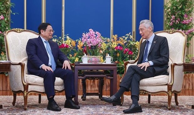 Premier vietnamita sostiene conversaciones con su homologo singapurense hinh anh 2