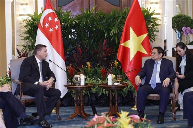 Premier solicita a Standard Chartered apoyar a Vietnam en transicion energetica hinh anh 1