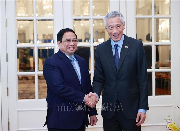 Visitas del premier de Vietnam generan nuevo impulso para lazos con Singapur y Brunei hinh anh 3