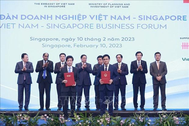 Gira del primer ministr por Singapur y Brunei alcanza resultados sustantivos hinh anh 2