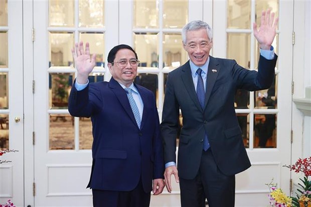 Visita del primer ministro vietnamita a Singapur brinda resultados practicos, evalua experto hinh anh 1