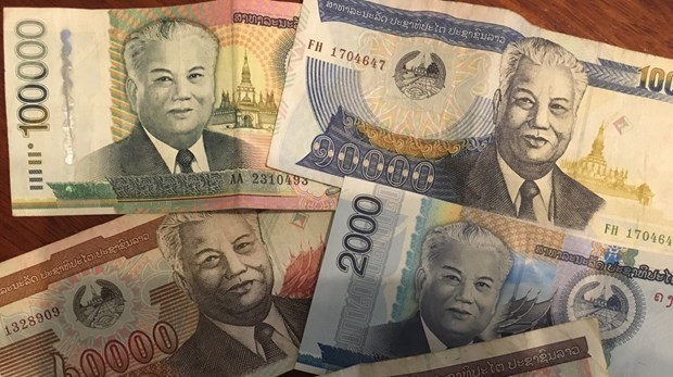 Banco central de Laos se esfuerza por estabilizar la moneda local hinh anh 1