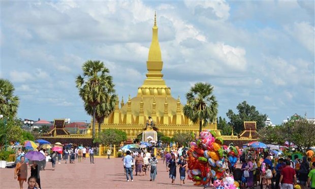Mas de 600 mil turistas extranjeros visitan Vientiane en 2022 hinh anh 1