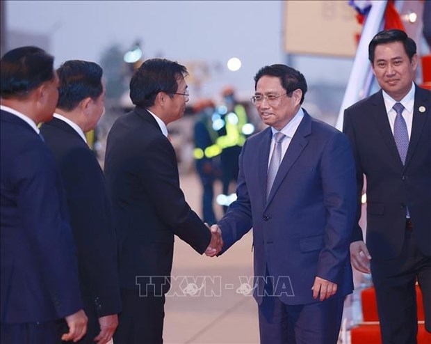 Primer ministro llega a Laos para la Cumbre de la Comision del rio Mekong hinh anh 2