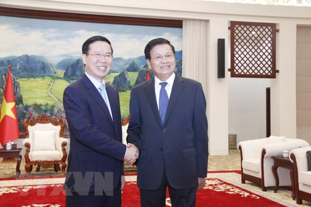 Visita oficial del presidente de Vietnam a Laos impulsara relaciones bilaterales hinh anh 1