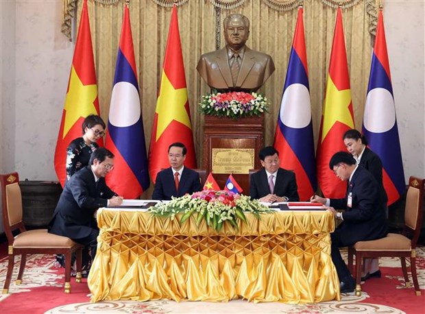 Presidente de Vietnam concluye su visita oficial a Laos hinh anh 2