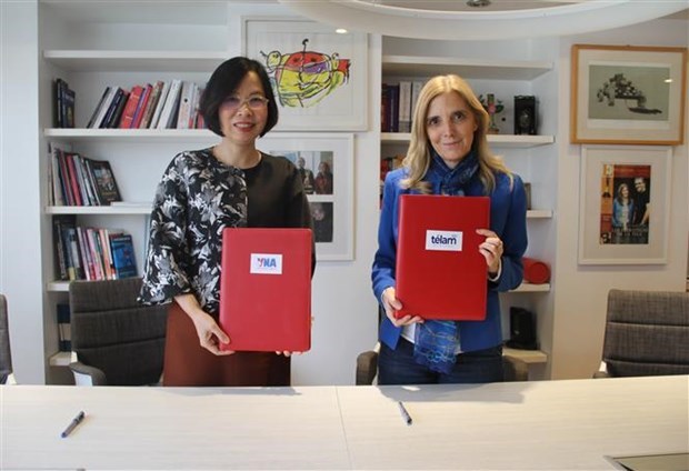 VNA y Telam firman acuerdo de cooperacion profesional hinh anh 2
