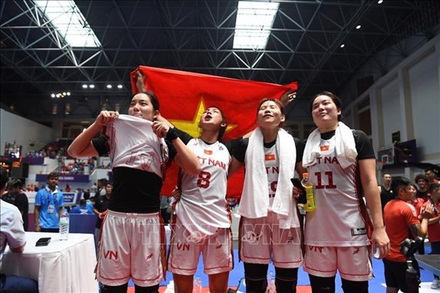 Equipo femenino vietnamita de baloncesto 3x3 gana medalla dorada en SEA Games 32 hinh anh 2