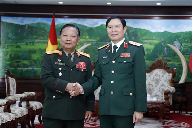 Cooperacion en defensa, pilar de los nexos Vietnam-Laos hinh anh 1