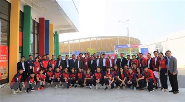 Pesista vietnamita establece tres plusmarcas en SEA Games 32 hinh anh 2