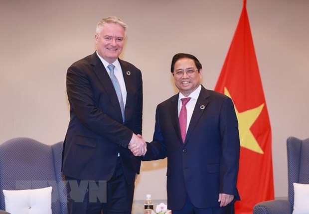 Primer ministro de Vietnam se reune con dirigentes del FMI y la OCDE hinh anh 2