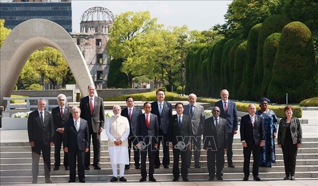 Primer ministro de Vietnam continua actividades en Hiroshima (Japon) hinh anh 2