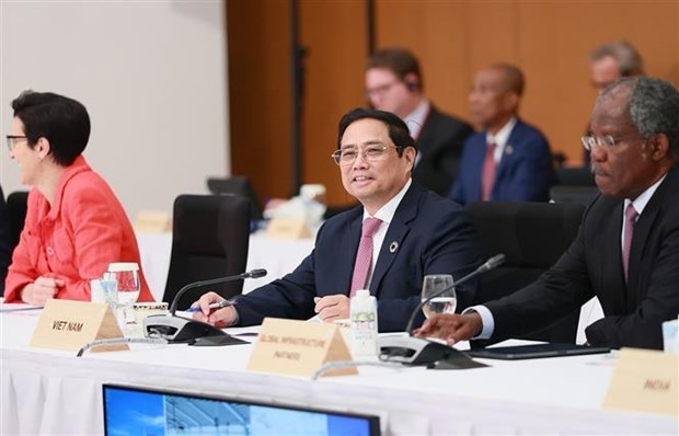 Premier vietnamita interviene en sesion de Cumbre del G7 sobre planeta sostenible hinh anh 1