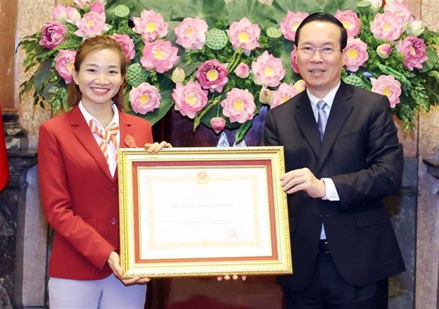 Presidente vietnamita se reune con atletas destacados en SEA Games 32 hinh anh 1