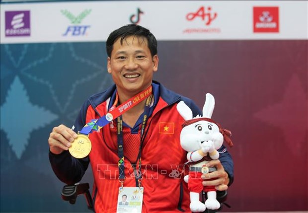 Vietnam obtiene ocho medallas de oro en ASEAN Para Games 12 hinh anh 1