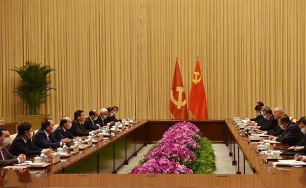 Delegacion del Partido Comunista de Vietnam visita China hinh anh 1