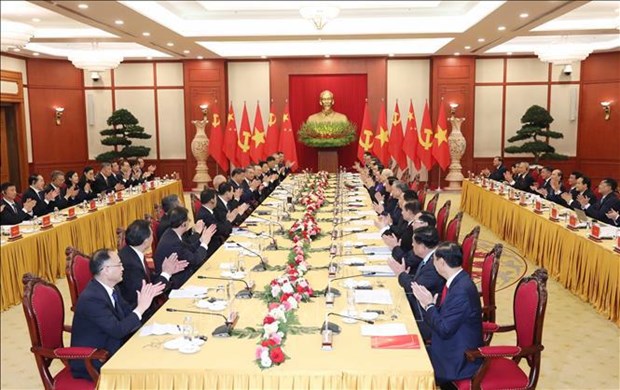 Medios internacionales acaparan reunion entre maximos dirigentes vietnamita y chino hinh anh 1