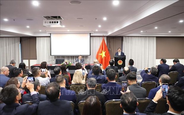 Primer ministro afirma atencion del Partido y Estado a comunidad de vietnamitas en el exterior hinh anh 2