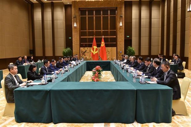Debaten orientaciones para agilizar lazos Vietnam- China en canal partidista hinh anh 1