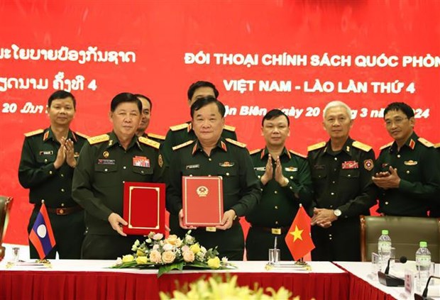 Efectuan IV Dialogo sobre Politica de Defensa Vietnam – Laos hinh anh 2