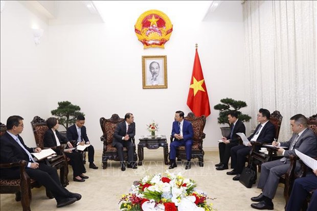 Viceprimer ministro vietnamita recibe al lider del grupo de energia de China hinh anh 1