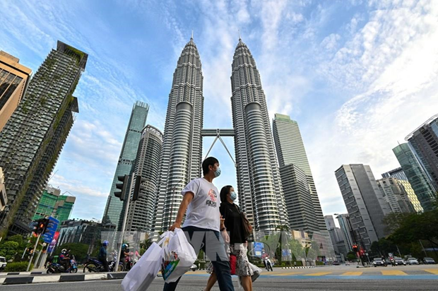 Mercado laboral de Malasia se mantendra estable en 2024 hinh anh 1