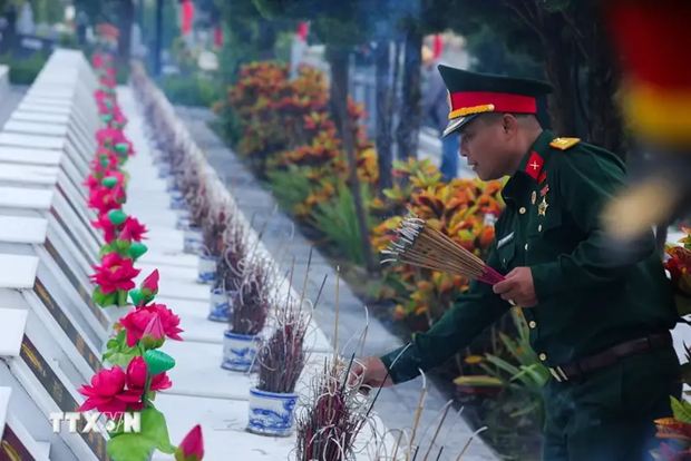 Entierran restos de martires vietnamitas en provincia de Ha Giang hinh anh 1