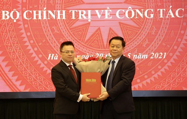 Le Quoc Minh asume el cargo de editor jefe del periodico Nhan Dan hinh anh 1