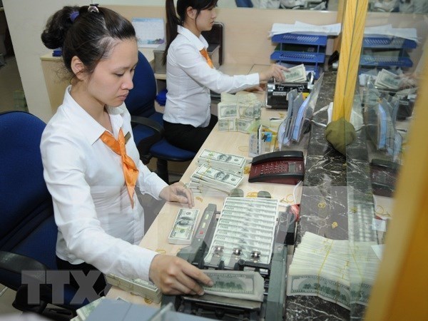 Aumentan remesas enviadas a Vietnam pese a COVID-19 hinh anh 1