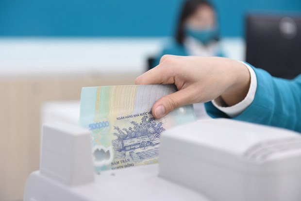 Bancos vietnamitas esperan gran beneficio en 2022 hinh anh 1